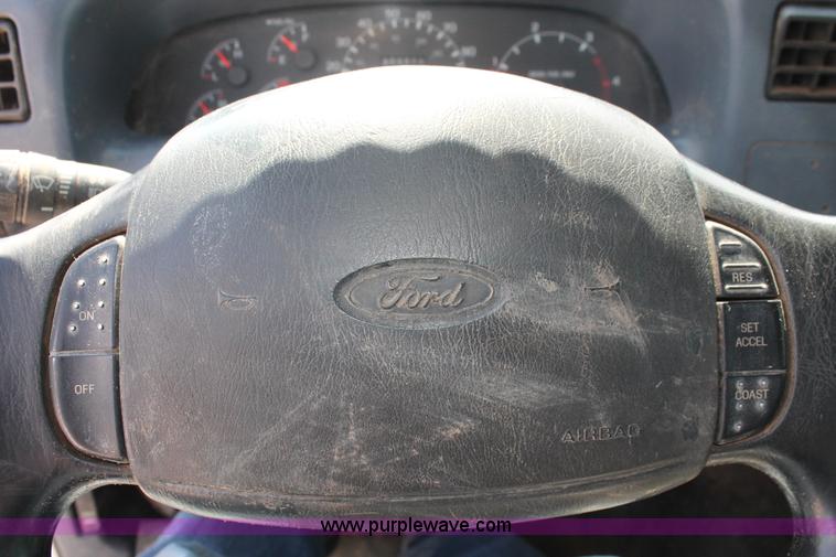 image for item H5794 1999 Ford F350 Super Duty XL Crew Cab flatbed pickup truck