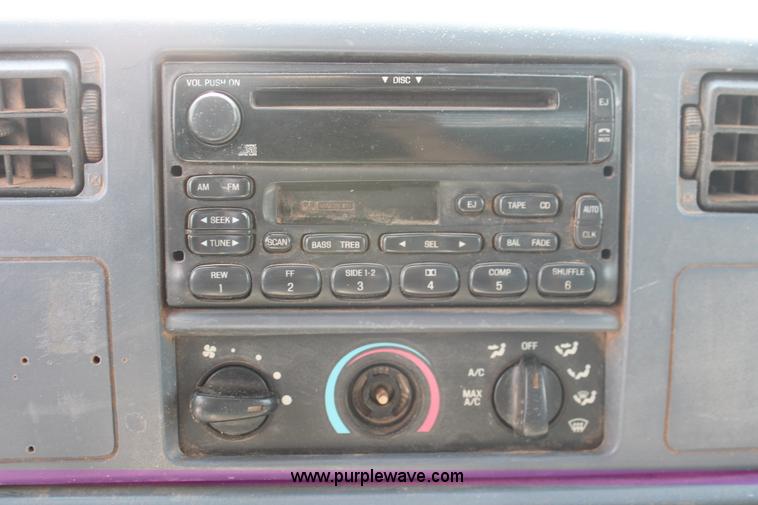 image for item H5794 1999 Ford F350 Super Duty XL Crew Cab flatbed pickup truck