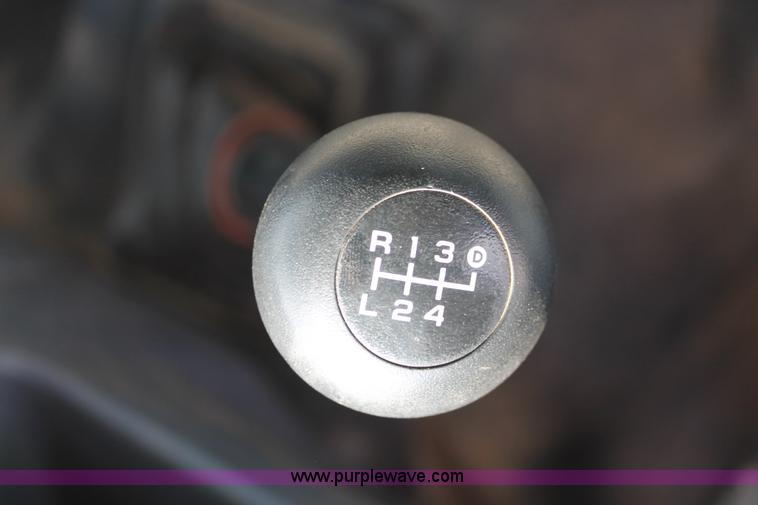 image for item H5794 1999 Ford F350 Super Duty XL Crew Cab flatbed pickup truck