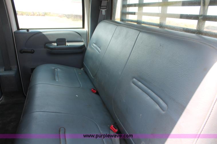 image for item H5794 1999 Ford F350 Super Duty XL Crew Cab flatbed pickup truck