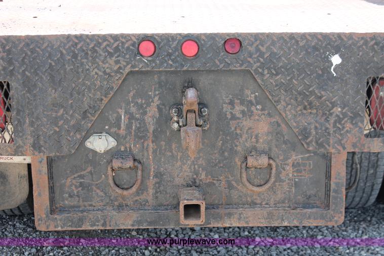 image for item H5794 1999 Ford F350 Super Duty XL Crew Cab flatbed pickup truck