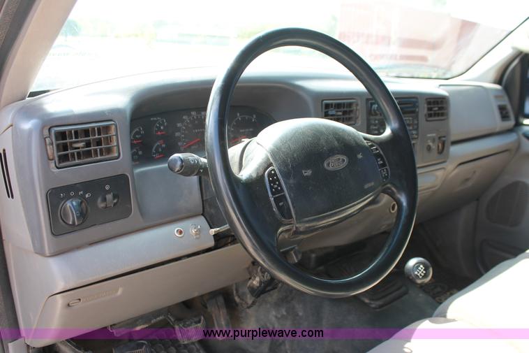 image for item H5797 2001 Ford F350 Super Duty XL SuperCab flatbed pickup truck