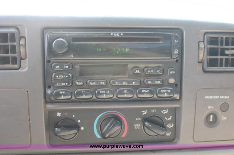 image for item H5797 2001 Ford F350 Super Duty XL SuperCab flatbed pickup truck