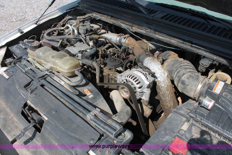 image for item H5797 2001 Ford F350 Super Duty XL SuperCab flatbed pickup truck