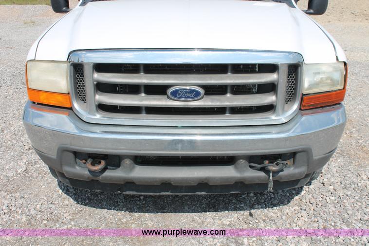 image for item H5797 2001 Ford F350 Super Duty XL SuperCab flatbed pickup truck