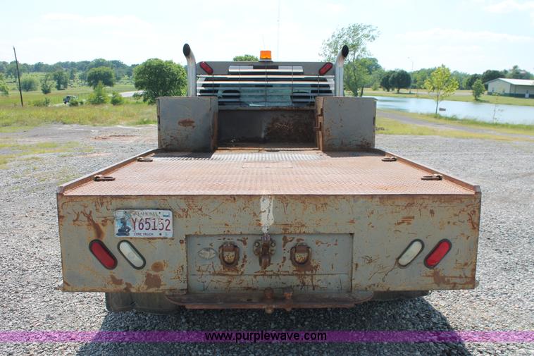 image for item H5797 2001 Ford F350 Super Duty XL SuperCab flatbed pickup truck