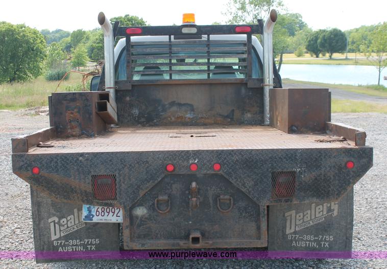 image for item H5798 2000 Ford F350 Super Duty XL Crew Cab flatbed pickup truck