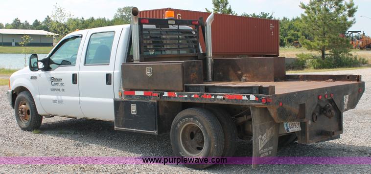 image for item H5798 2000 Ford F350 Super Duty XL Crew Cab flatbed pickup truck