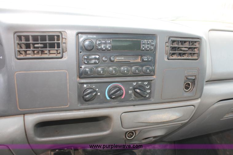 image for item H5798 2000 Ford F350 Super Duty XL Crew Cab flatbed pickup truck