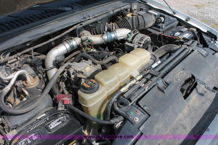 image for item H5798 2000 Ford F350 Super Duty XL Crew Cab flatbed pickup truck