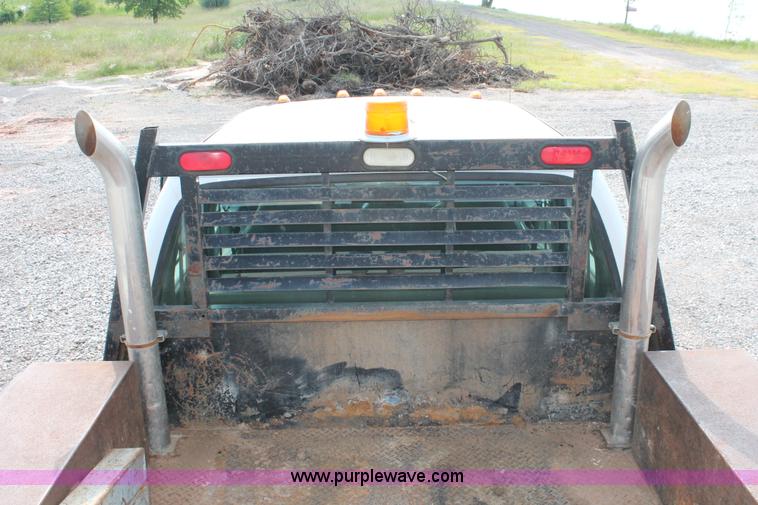 image for item H5798 2000 Ford F350 Super Duty XL Crew Cab flatbed pickup truck