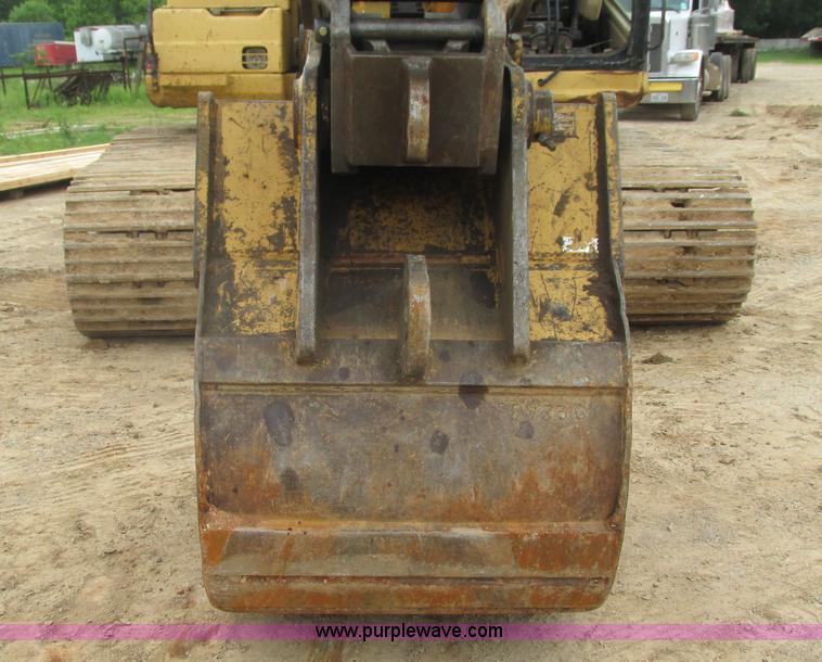 image for item J8523 1999 Caterpillar 325BL excavator