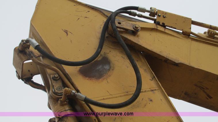 image for item J8523 1999 Caterpillar 325BL excavator