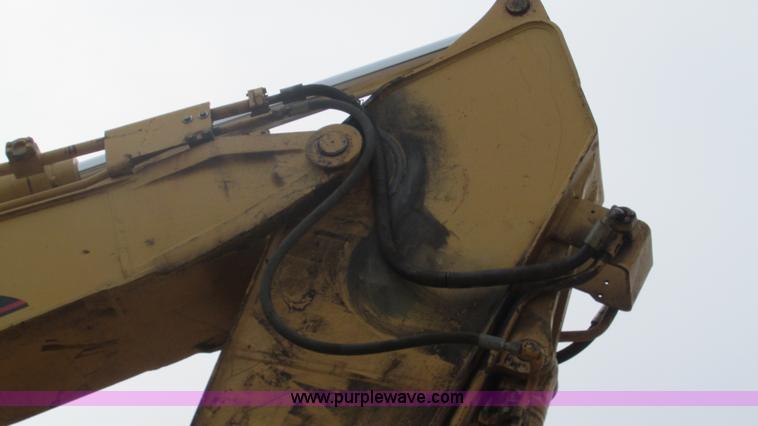 image for item J8523 1999 Caterpillar 325BL excavator