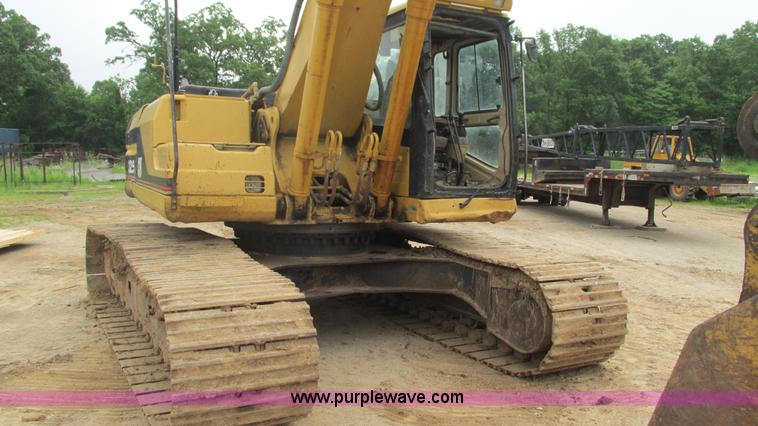 image for item J8523 1999 Caterpillar 325BL excavator