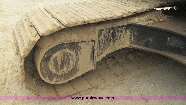 image for item J8523 1999 Caterpillar 325BL excavator