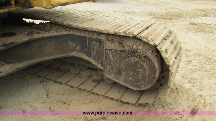 image for item J8523 1999 Caterpillar 325BL excavator