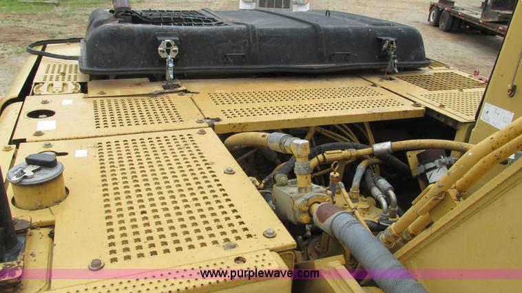 image for item J8523 1999 Caterpillar 325BL excavator