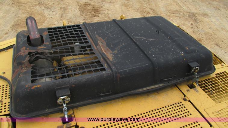 image for item J8523 1999 Caterpillar 325BL excavator