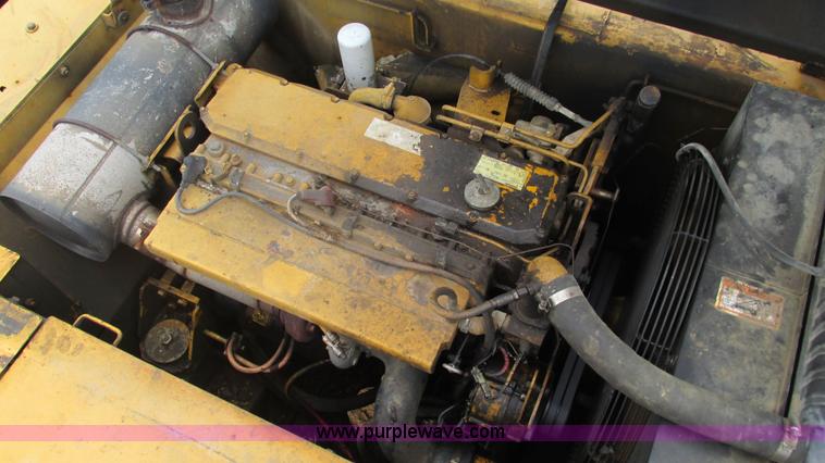 image for item J8523 1999 Caterpillar 325BL excavator