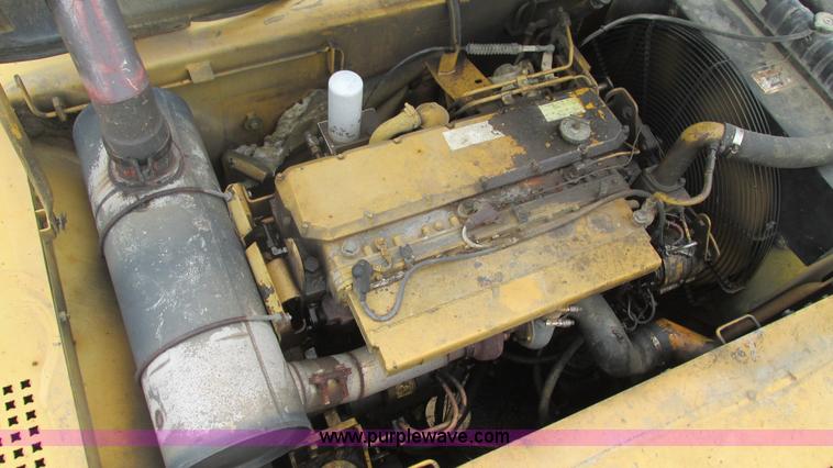 image for item J8523 1999 Caterpillar 325BL excavator