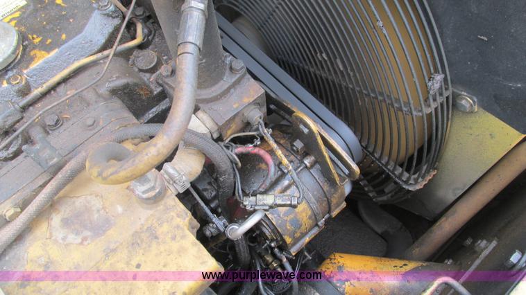 image for item J8523 1999 Caterpillar 325BL excavator