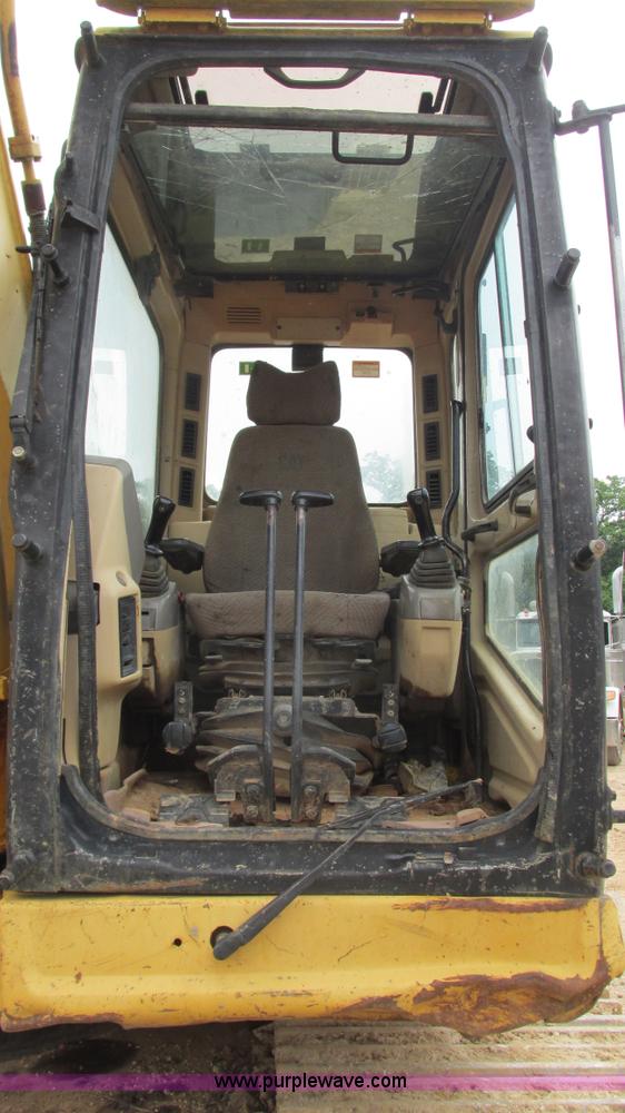 image for item J8523 1999 Caterpillar 325BL excavator