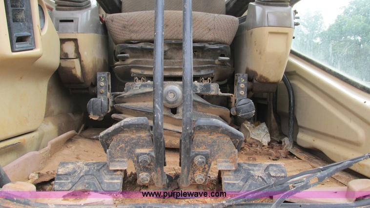image for item J8523 1999 Caterpillar 325BL excavator