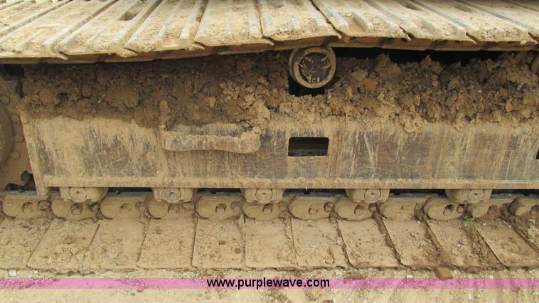 image for item J8523 1999 Caterpillar 325BL excavator