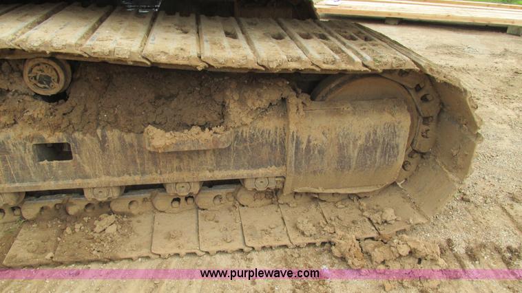 image for item J8523 1999 Caterpillar 325BL excavator