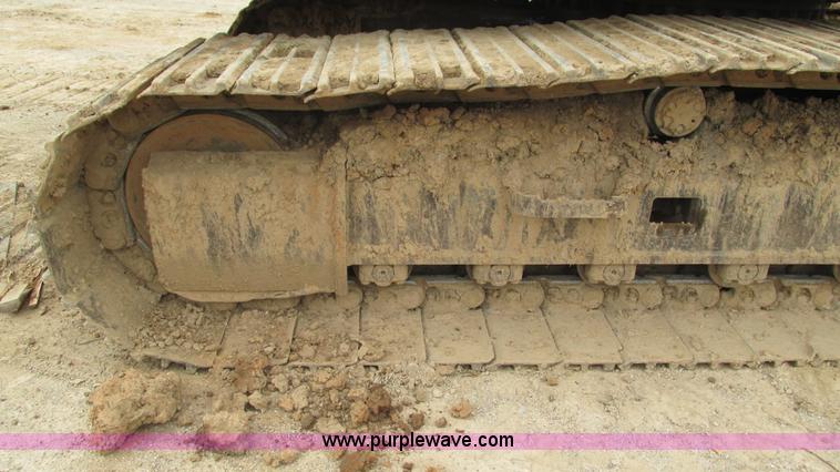 image for item J8523 1999 Caterpillar 325BL excavator