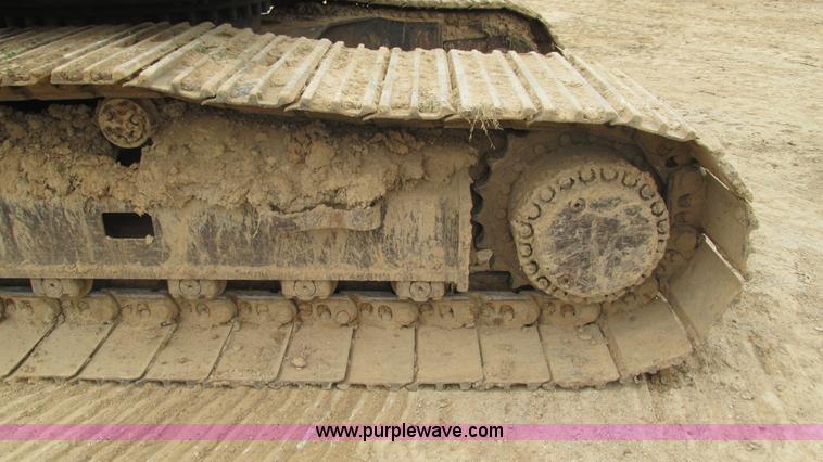 image for item J8523 1999 Caterpillar 325BL excavator