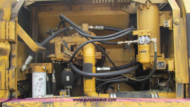image for item J8523 1999 Caterpillar 325BL excavator