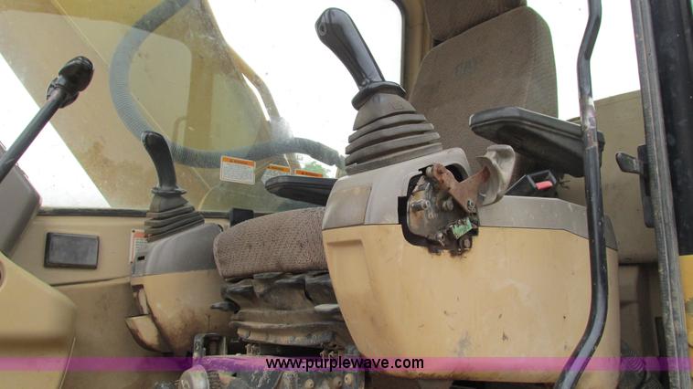 image for item J8523 1999 Caterpillar 325BL excavator