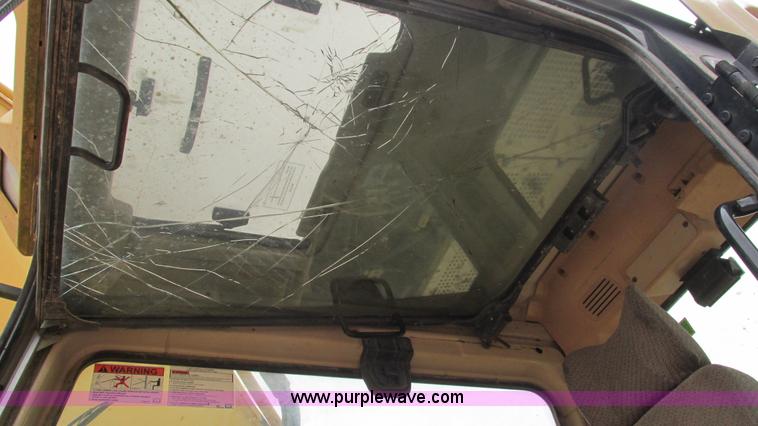 image for item J8523 1999 Caterpillar 325BL excavator