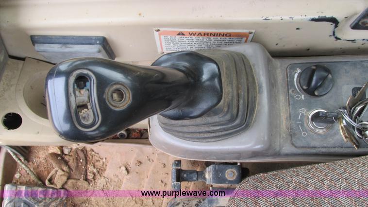 image for item J8523 1999 Caterpillar 325BL excavator