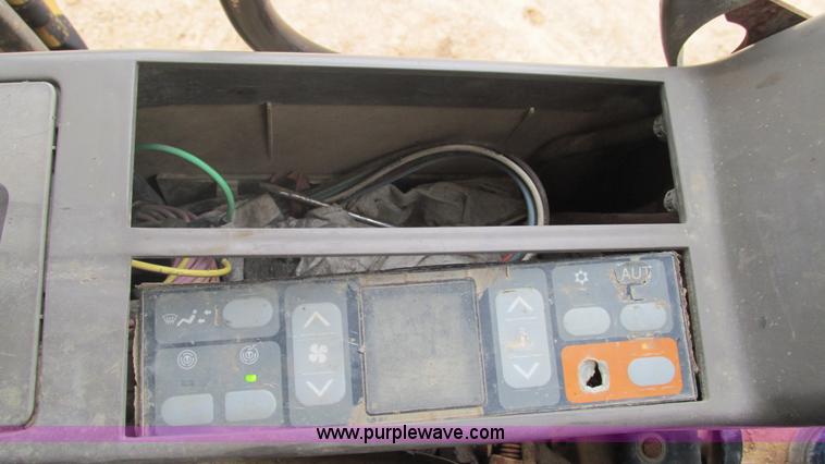 image for item J8523 1999 Caterpillar 325BL excavator