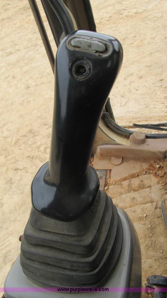 image for item J8523 1999 Caterpillar 325BL excavator