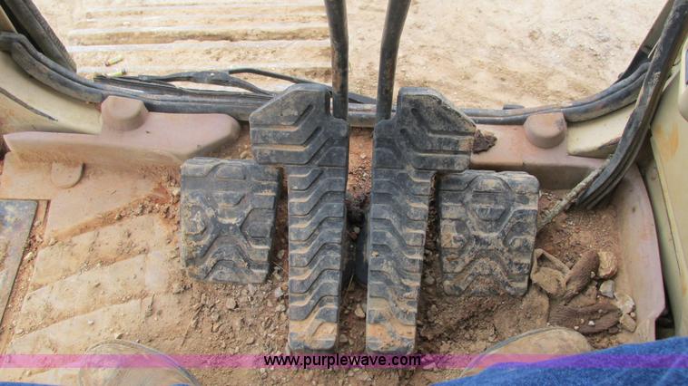 image for item J8523 1999 Caterpillar 325BL excavator