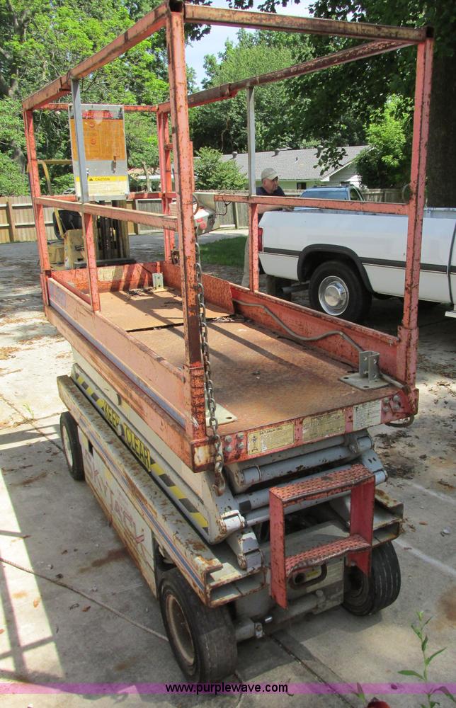 image for item R9303 1994 Skyjack SJ-3220 Series II scissor lift