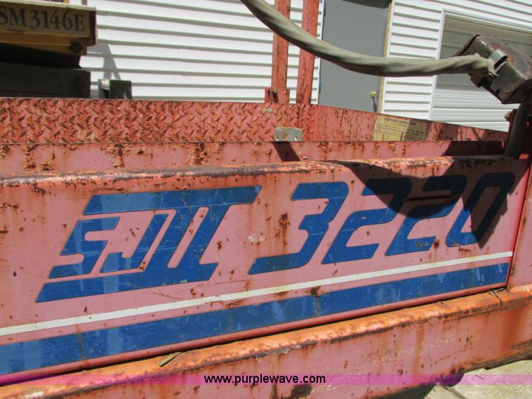 image for item R9303 1994 Skyjack SJ-3220 Series II scissor lift