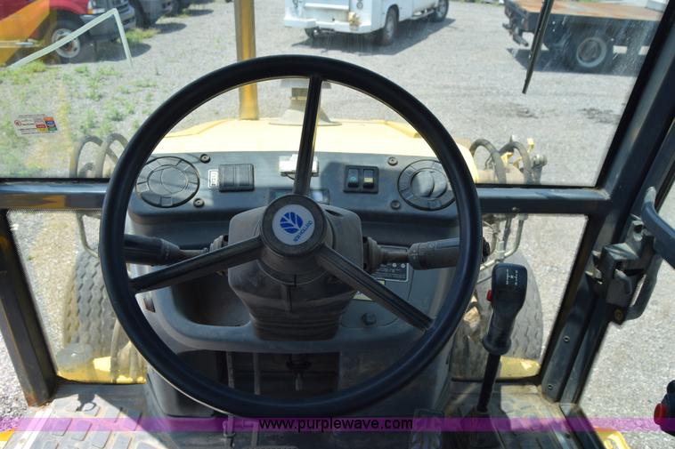 image for item K8521 2003 New Holland LB75 backhoe