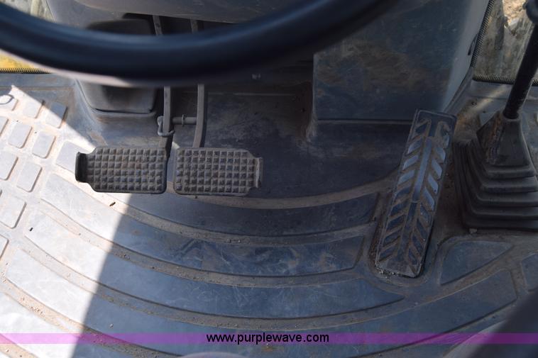 image for item K8521 2003 New Holland LB75 backhoe