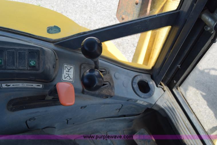 image for item K8521 2003 New Holland LB75 backhoe