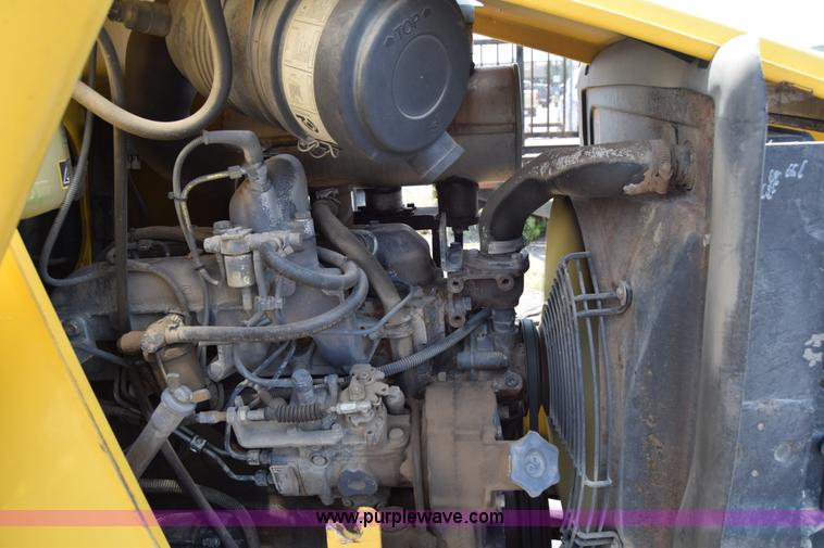 image for item K8521 2003 New Holland LB75 backhoe