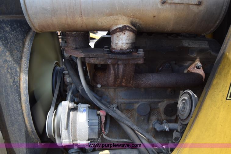 image for item K8521 2003 New Holland LB75 backhoe