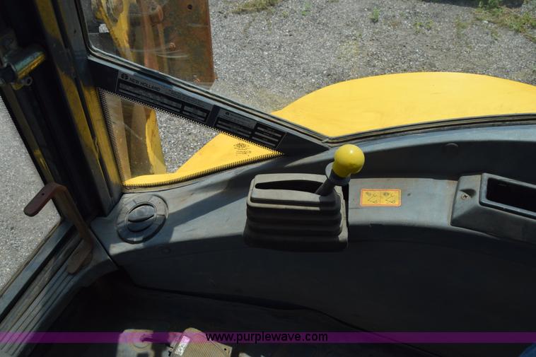 image for item K8521 2003 New Holland LB75 backhoe