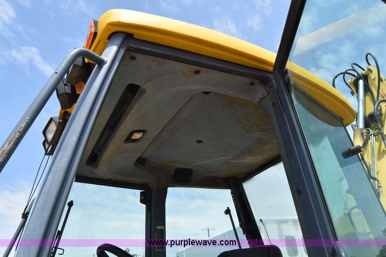 image for item K8521 2003 New Holland LB75 backhoe