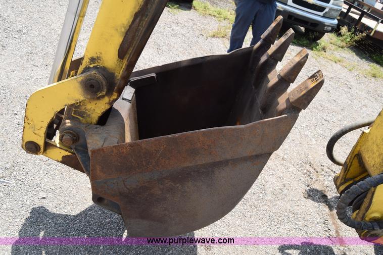 image for item K8521 2003 New Holland LB75 backhoe