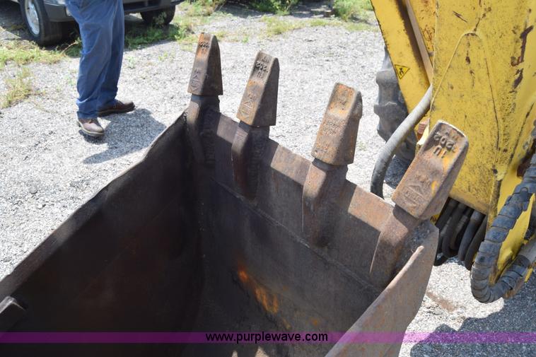 image for item K8521 2003 New Holland LB75 backhoe